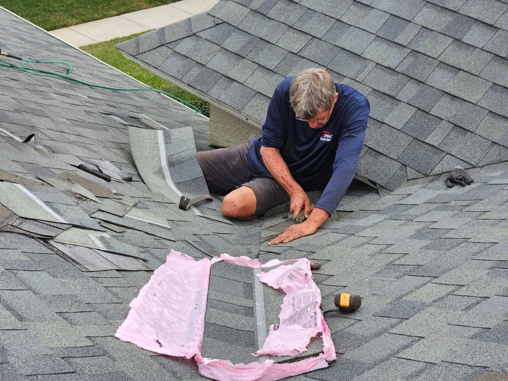A Roof Being Repaired by All Pro Roofing